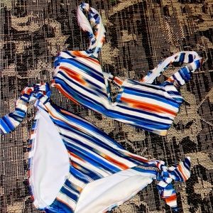 This adorable, fitting, XS - M sized bathing suit will have people staring!!